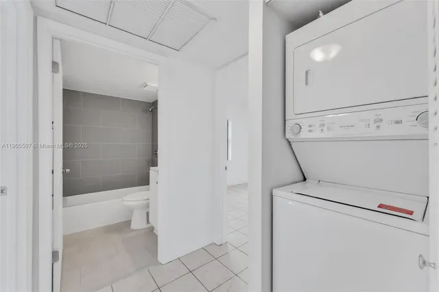 a bathroom with a bathtub and toilet