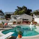 an outdoor space with the patio and swimming pool