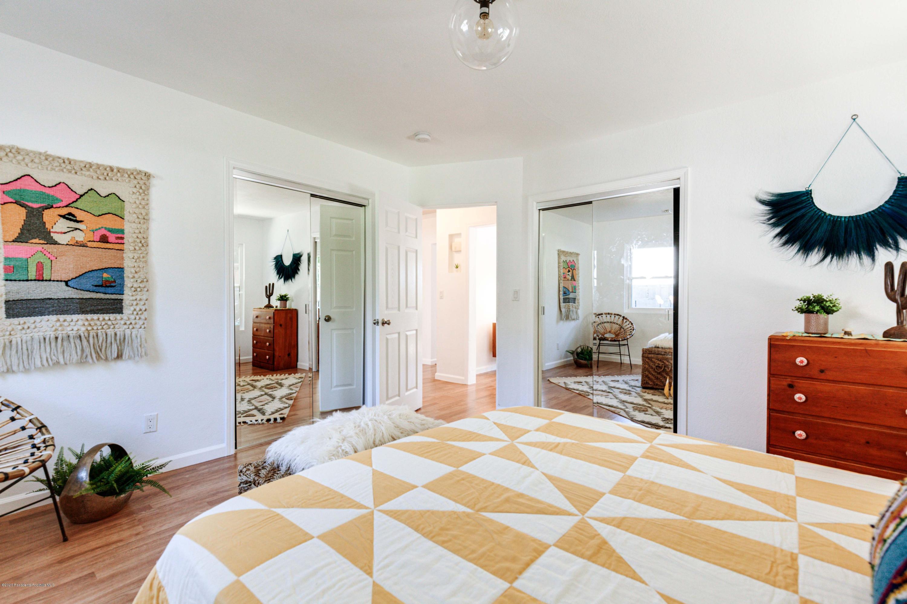 58 Mountain View Street Altadena, CA 91001 - Photo 11 of 30 a bedroom with a bed and a dresser