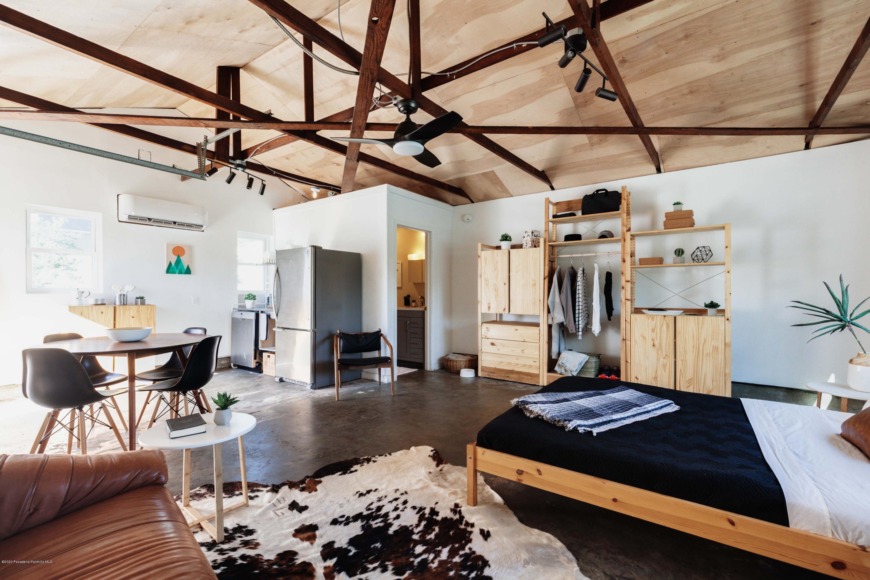58 Mountain View Street Altadena, CA 91001 - Photo 16 of 30 a living room with lots of furniture and wooden floor