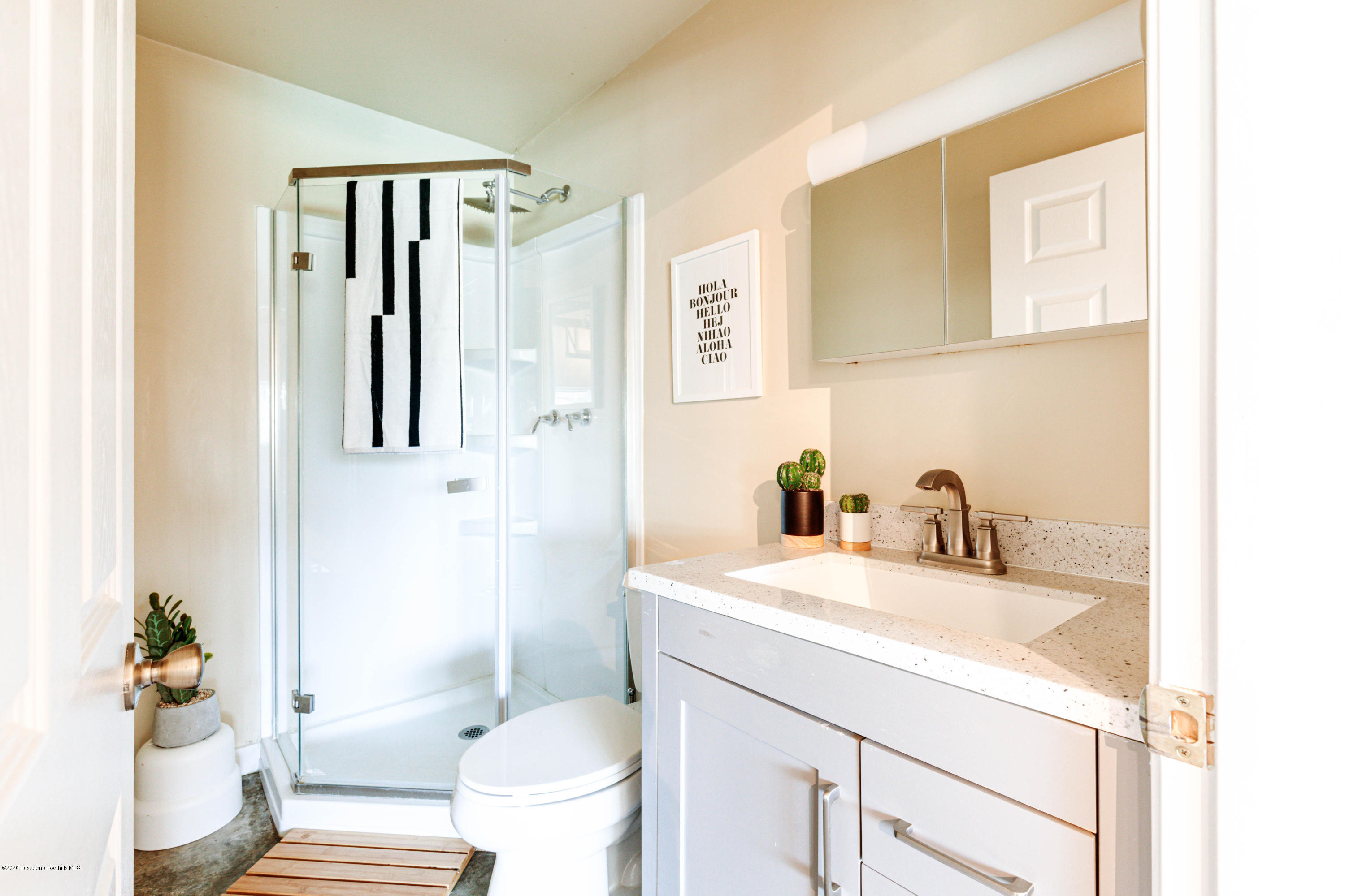 58 Mountain View Street Altadena, CA 91001 - Photo 18 of 30 a bathroom with a sink toilet and shower