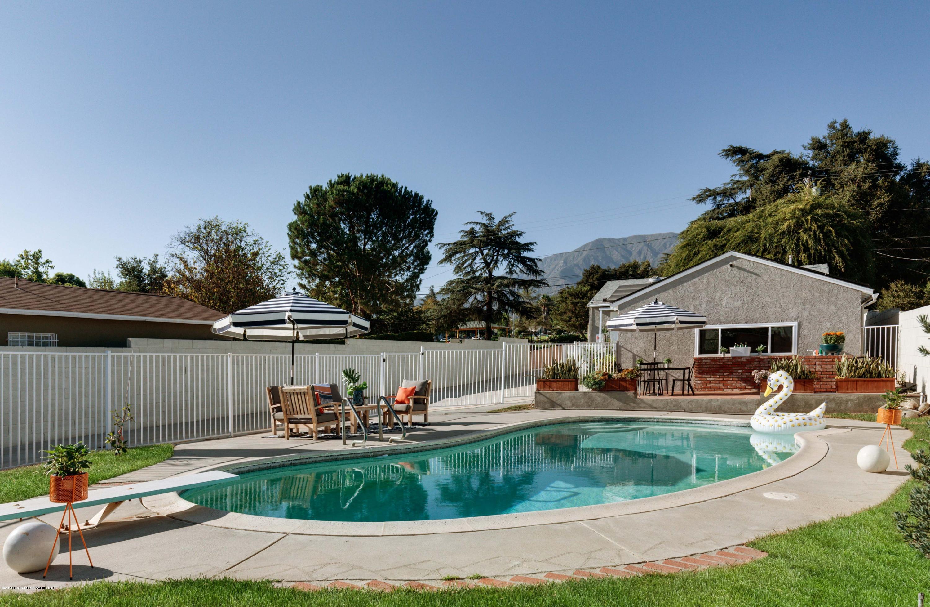 58 Mountain View Street Altadena, CA 91001 - Photo 21 of 30 a front view of a house with garden