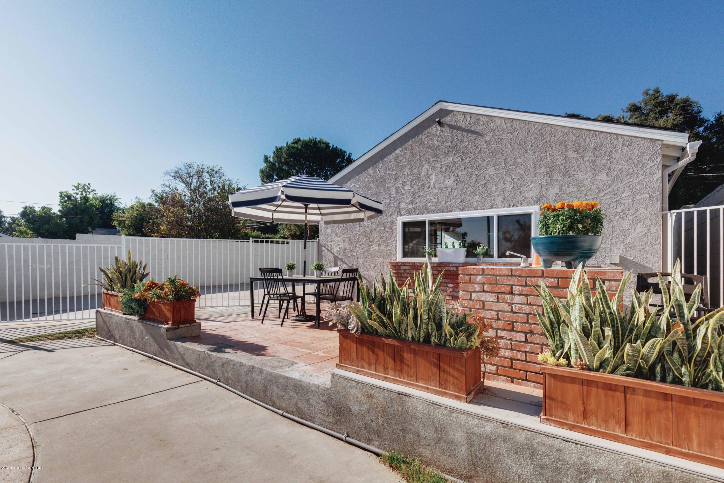 58 Mountain View Street Altadena, CA 91001 - Photo 22 of 30 a view of house with patio outdoor seating