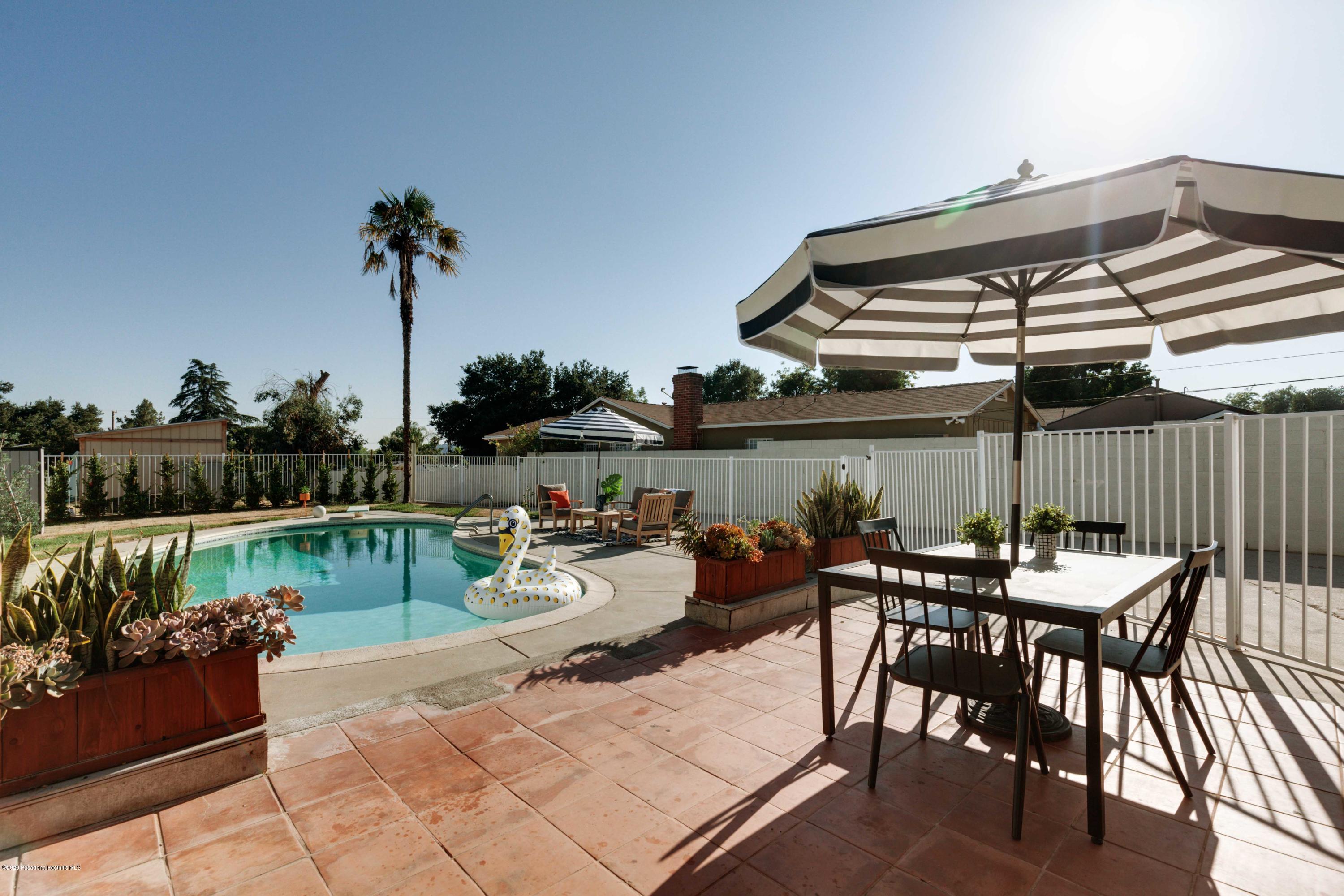 58 Mountain View Street Altadena, CA 91001 - Photo 23 of 30 a view of a chairs and table in patio