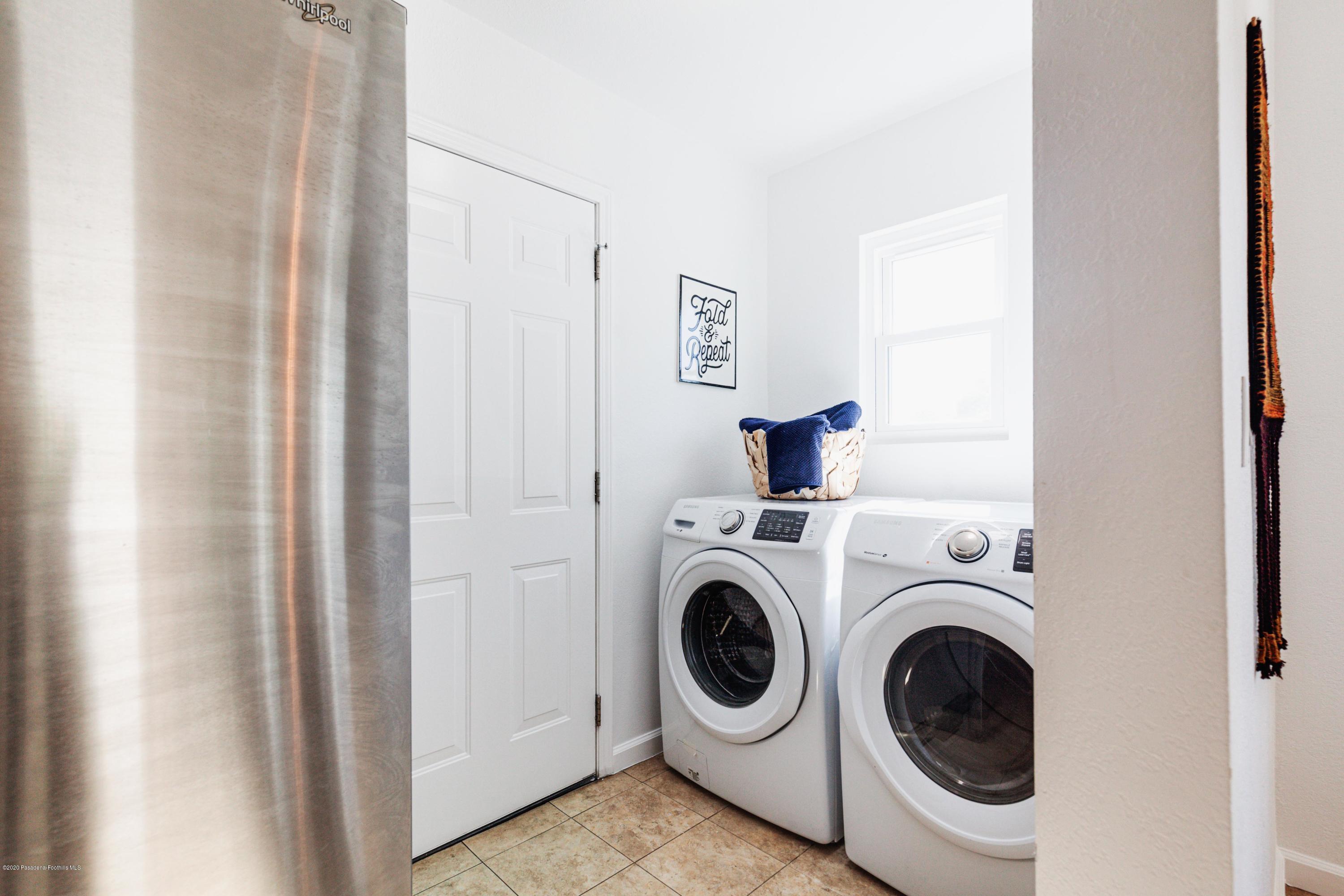 58 Mountain View Street Altadena, CA 91001 - Photo 9 of 30 a utility room with dryer and washer