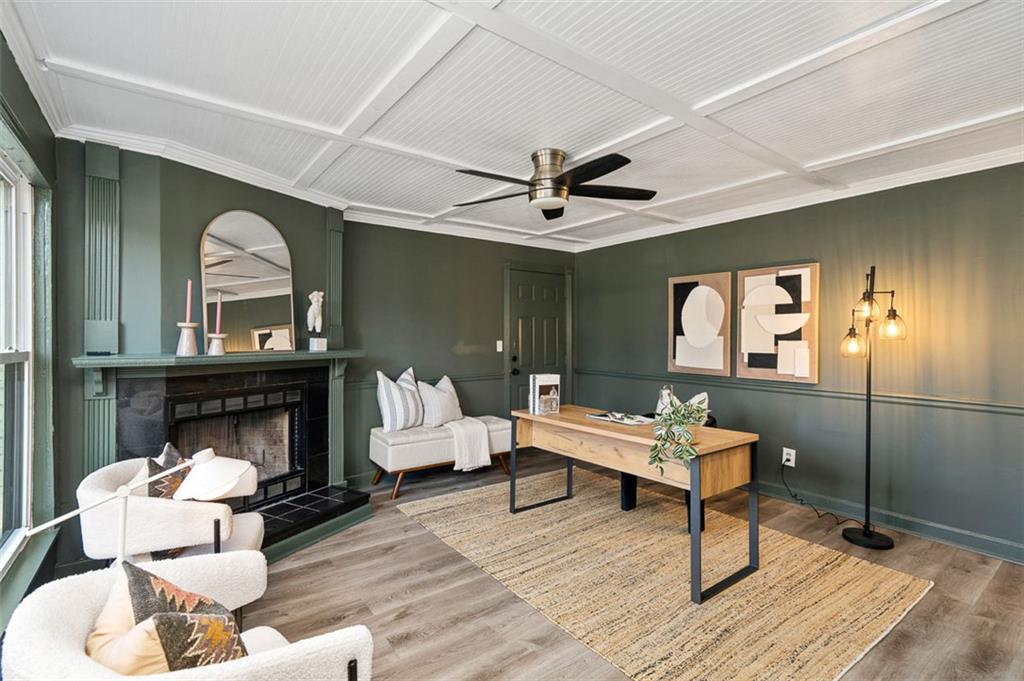 3059 Trafalgar Way Atlanta, GA 30341 - Photo 14 of 52 a living room with furniture a rug and a fireplace