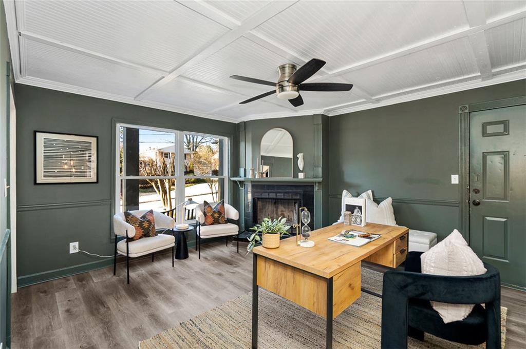 3059 Trafalgar Way Atlanta, GA 30341 - Photo 15 of 52 a living room with furniture a fireplace and a large window