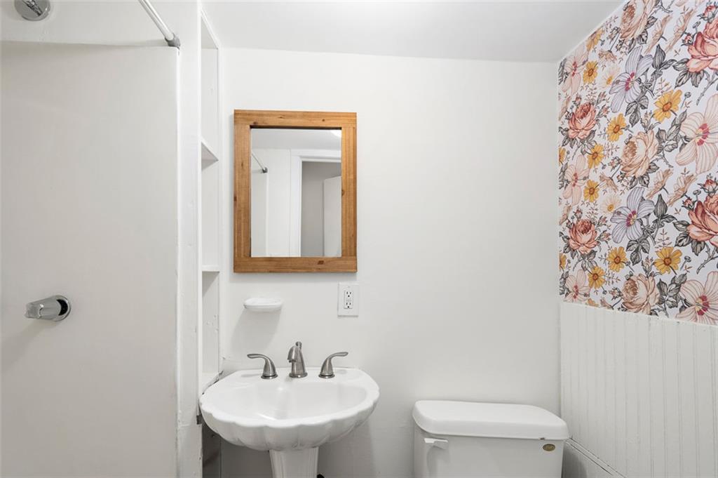 3059 Trafalgar Way Atlanta, GA 30341 - Photo 22 of 52 a bathroom with a sink toilet and mirror