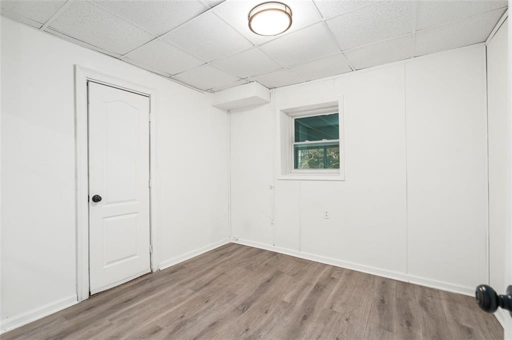 3059 Trafalgar Way Atlanta, GA 30341 - Photo 26 of 52 an empty room with wooden floor and windows