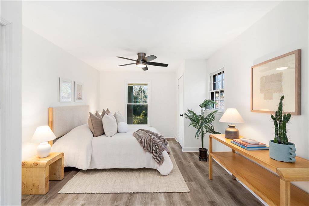 3059 Trafalgar Way Atlanta, GA 30341 - Photo 30 of 52 a living room with furniture and a potted plant