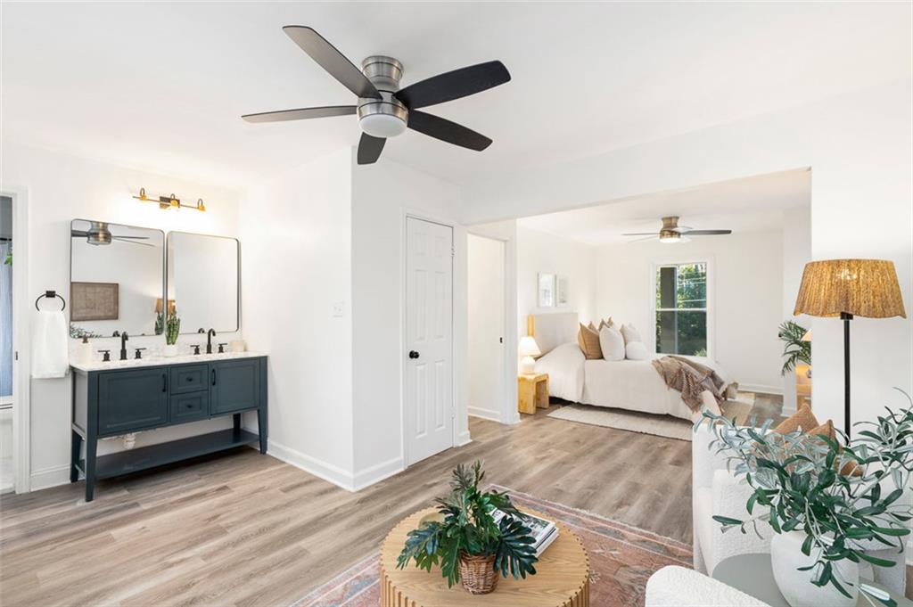 3059 Trafalgar Way Atlanta, GA 30341 - Photo 34 of 52 a bedroom with furniture and a mirror