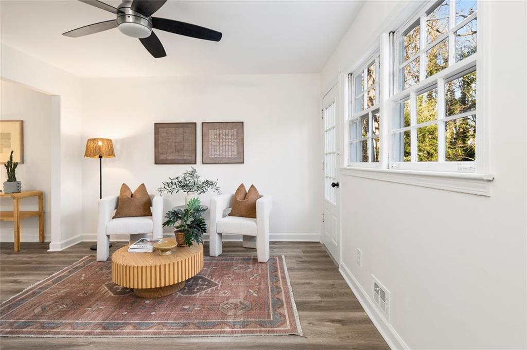 3059 Trafalgar Way Atlanta, GA 30341 - Photo 35 of 52 a living room with furniture and a rug