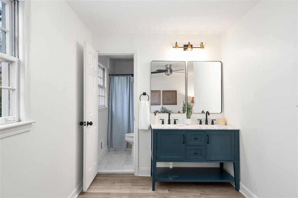 3059 Trafalgar Way Atlanta, GA 30341 - Photo 36 of 52 a view of bathroom with a sink mirror and window