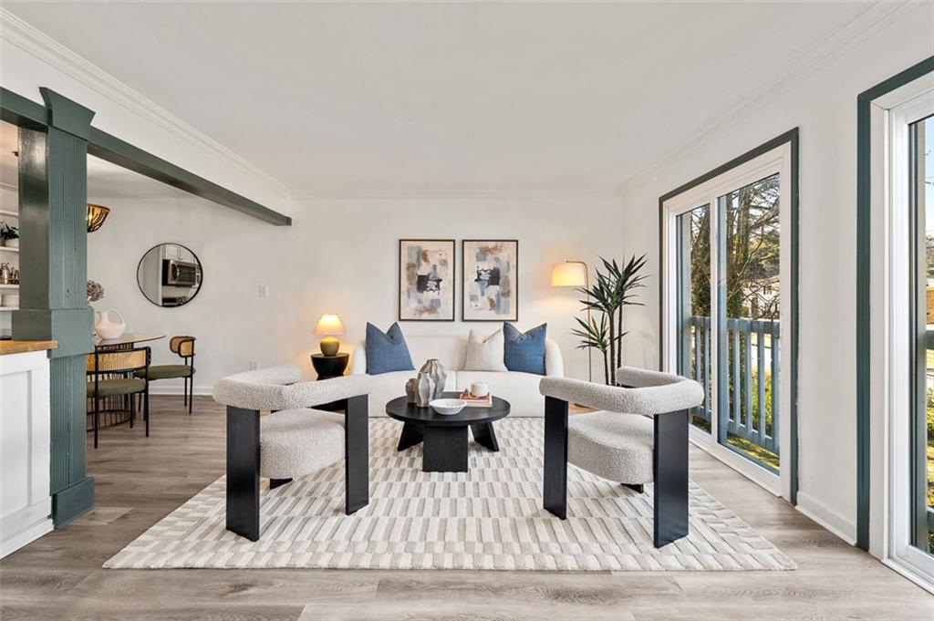 3059 Trafalgar Way Atlanta, GA 30341 - Photo 5 of 52 a living room with furniture a large window and a table