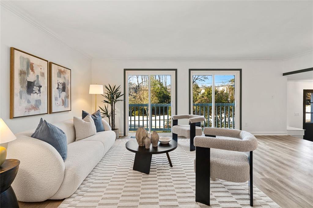 3059 Trafalgar Way Atlanta, GA 30341 - Photo 7 of 52 a living room with furniture and a large window