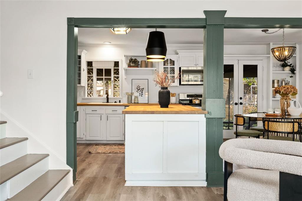 3059 Trafalgar Way Atlanta, GA 30341 - Photo 9 of 52 a living room with furniture and a clock