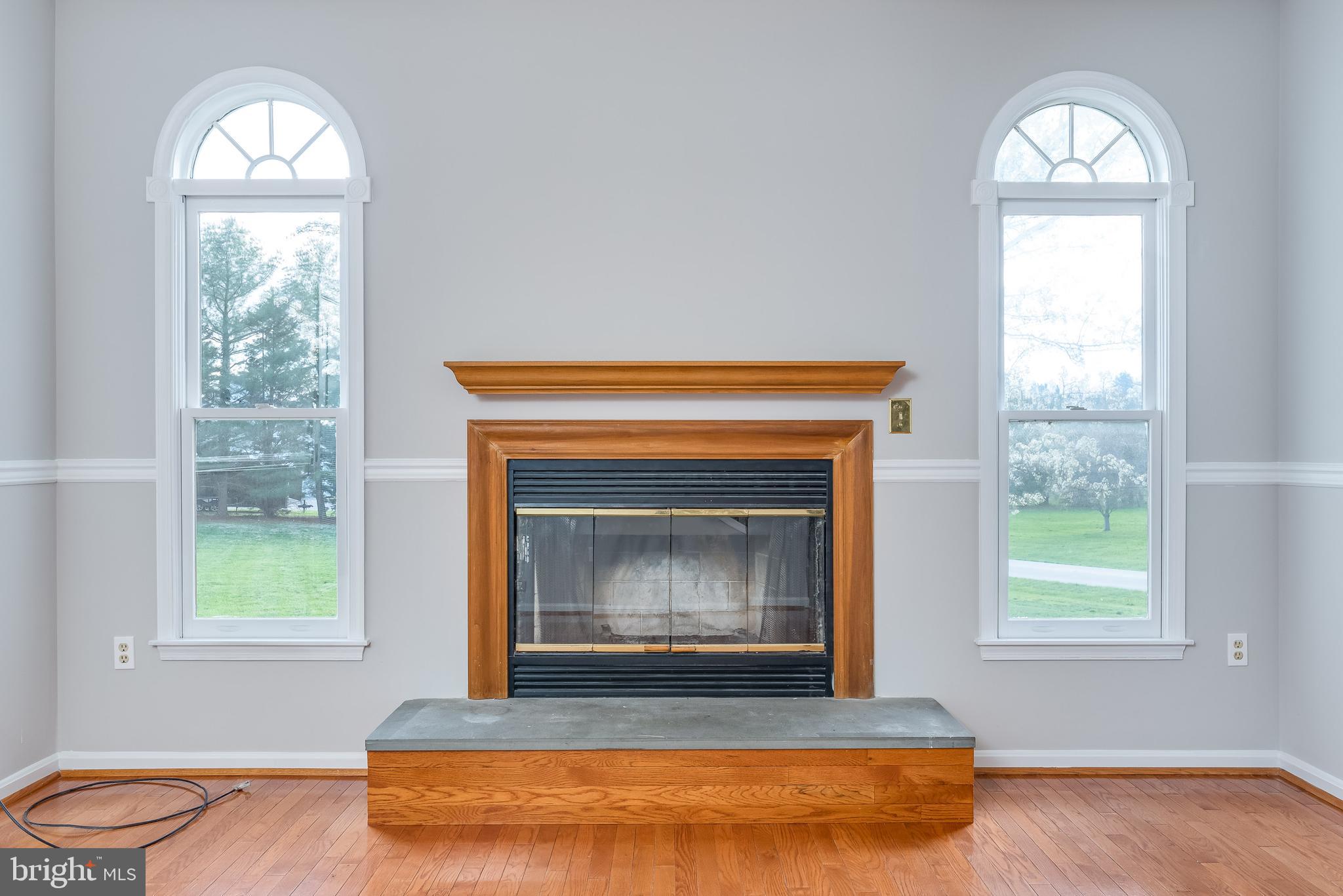 346 Deer Ridge Drive Harpers Ferry, WV 25425 - Photo 16 of 63 Wood-burning fireplace with raised hearth - cozy!