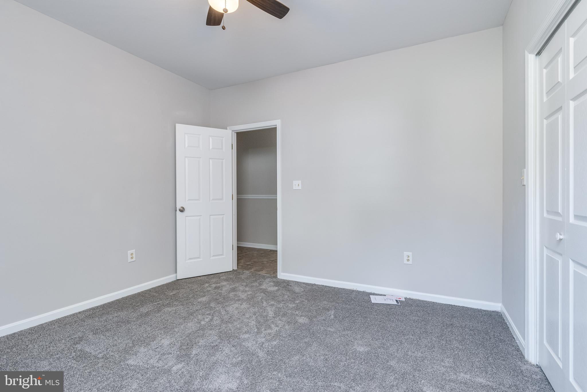 346 Deer Ridge Drive Harpers Ferry, WV 25425 - Photo 24 of 63 Main level bedroom is carpeted for comfort with a