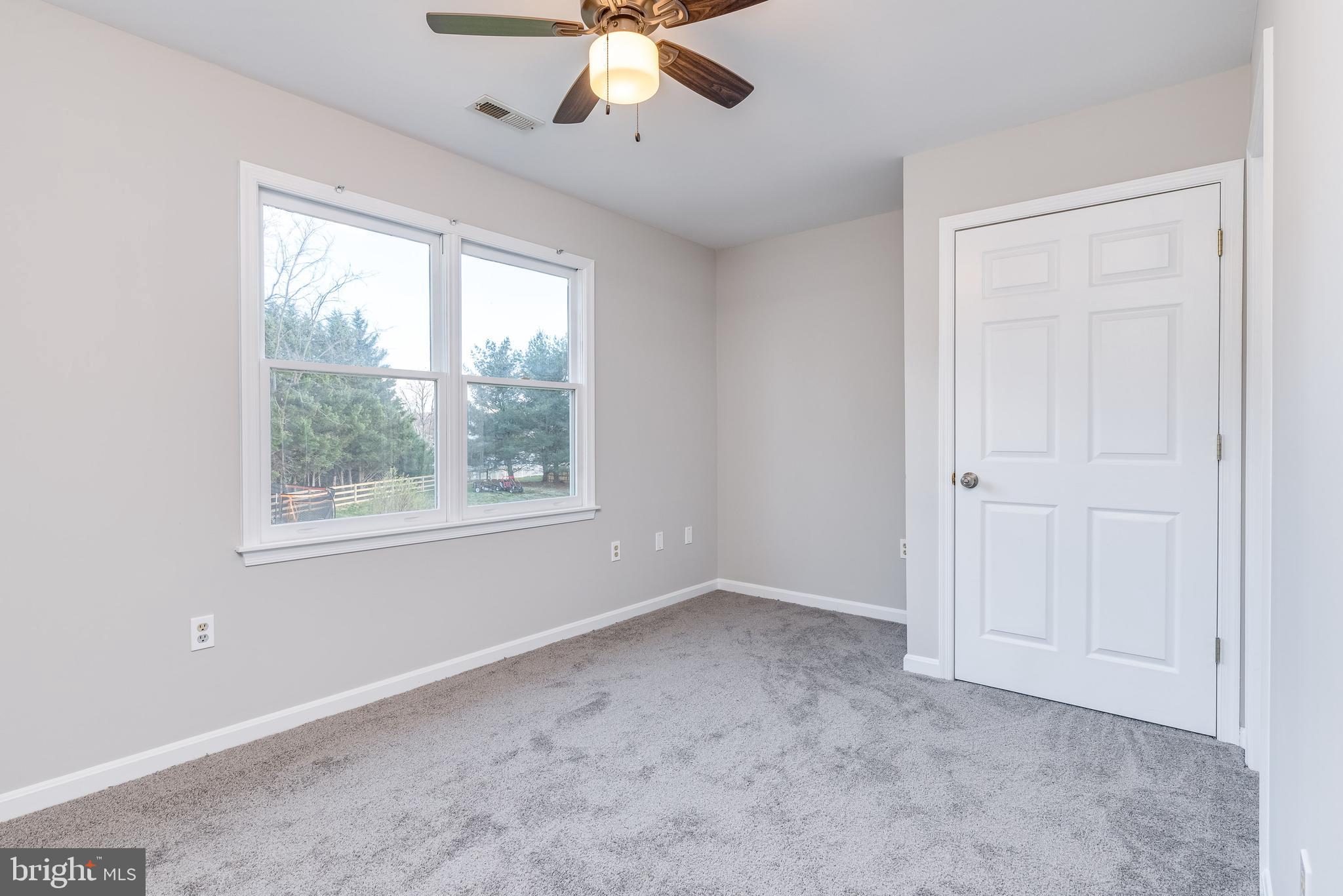 346 Deer Ridge Drive Harpers Ferry, WV 25425 - Photo 31 of 63 Bedroom 1 features large windows and closet for