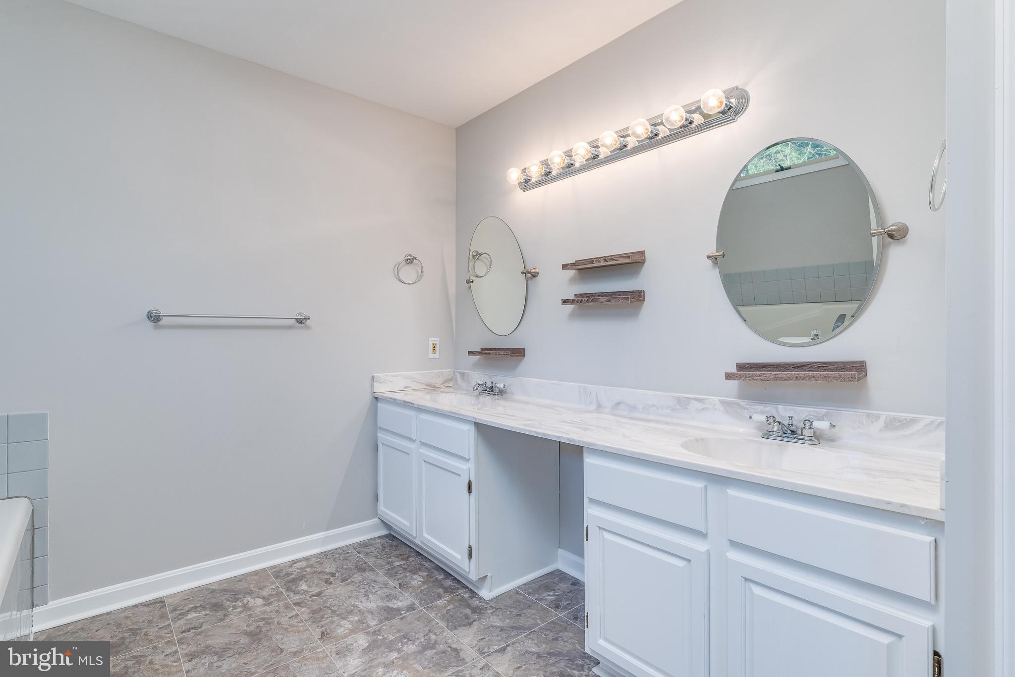 346 Deer Ridge Drive Harpers Ferry, WV 25425 - Photo 40 of 63 Primary bath 8ft vanity w/ dressing table