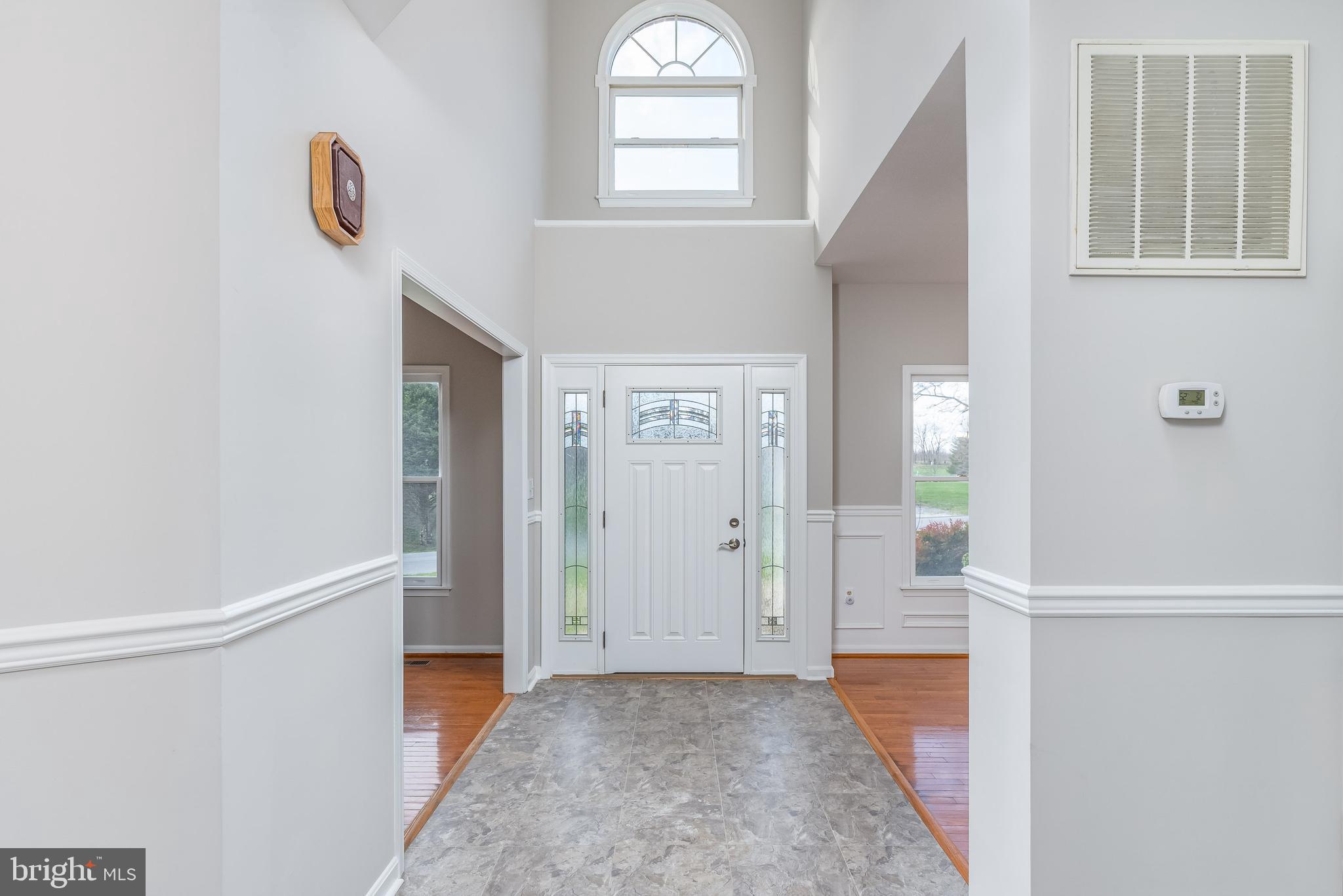 346 Deer Ridge Drive Harpers Ferry, WV 25425 - Photo 8 of 63 Grand 2 story ceilings and arched window detail