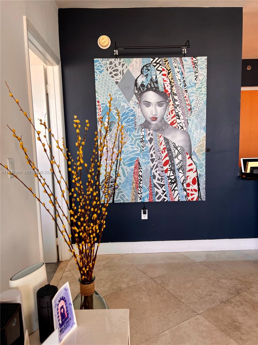 400 Alton Road, Unit LPH3007 Miami Beach, FL 33139 - Photo 11 of 51 a view of entryway with paintings on the wall