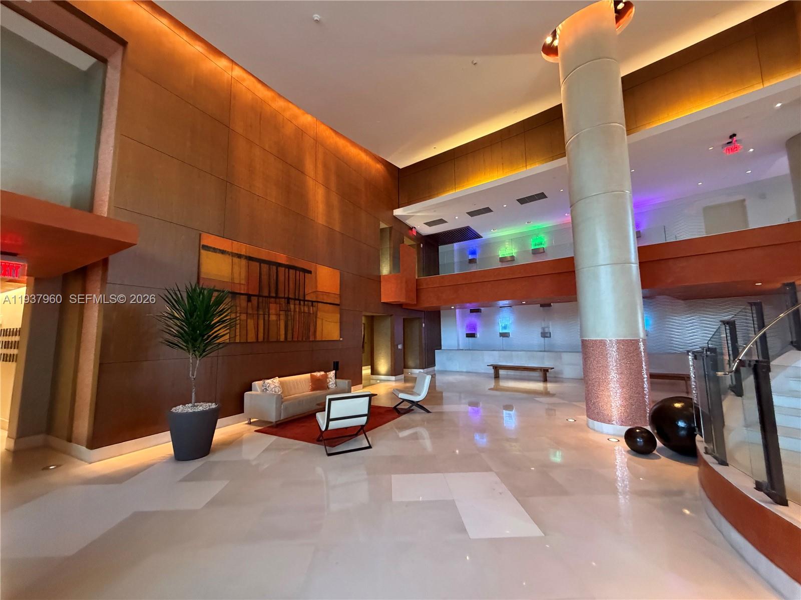 400 Alton Road, Unit LPH3007 Miami Beach, FL 33139 - Photo 27 of 51 a outdoor space with patio furniture and a potted plant