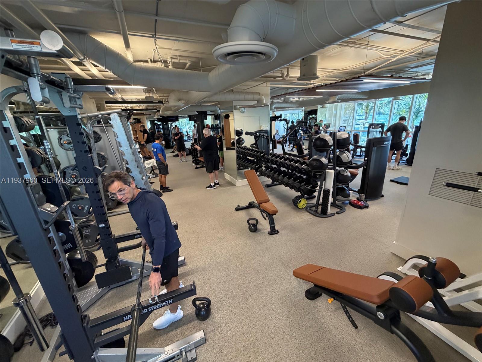 400 Alton Road, Unit LPH3007 Miami Beach, FL 33139 - Photo 33 of 51 a view of a room with gym equipment