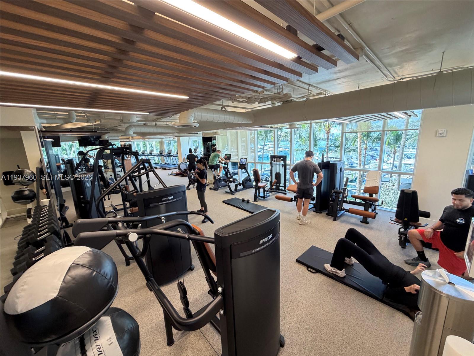 400 Alton Road, Unit LPH3007 Miami Beach, FL 33139 - Photo 34 of 51 a view of a room with gym equipment