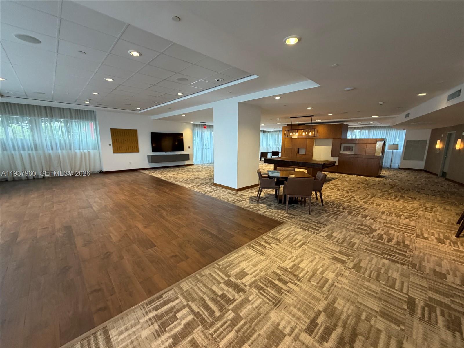 400 Alton Road, Unit LPH3007 Miami Beach, FL 33139 - Photo 40 of 51 a view of a living room and kitchen