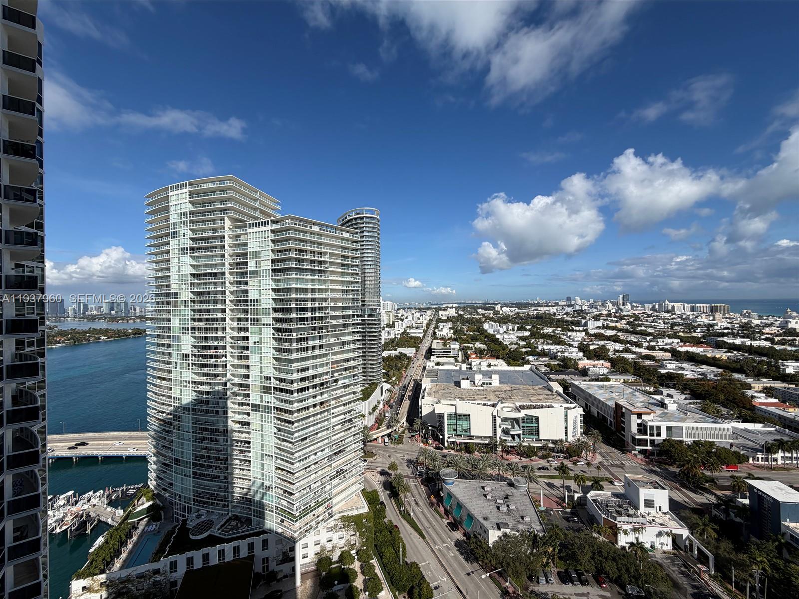 400 Alton Road, Unit LPH3007 Miami Beach, FL 33139 - Photo 43 of 51 a view of a city with tall buildings