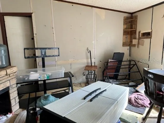 a view of a workspace with furniture