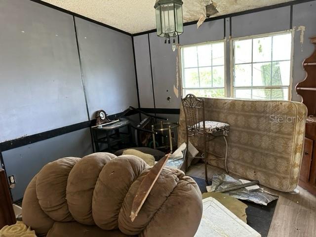 10207 East Pike Drive Inverness, FL 34450 - Photo 6 of 13 a bed room with a bed and a window