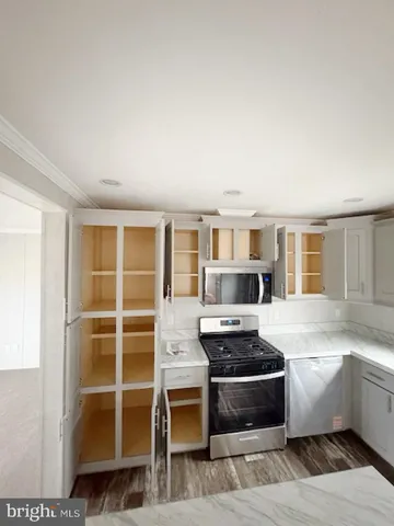 a bathroom with a sink toilet a shower and a bathtub