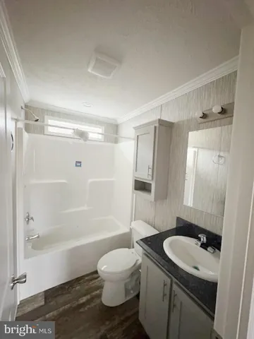 a kitchen with a sink and a window