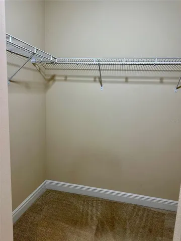 a view of a room with racks on the wall