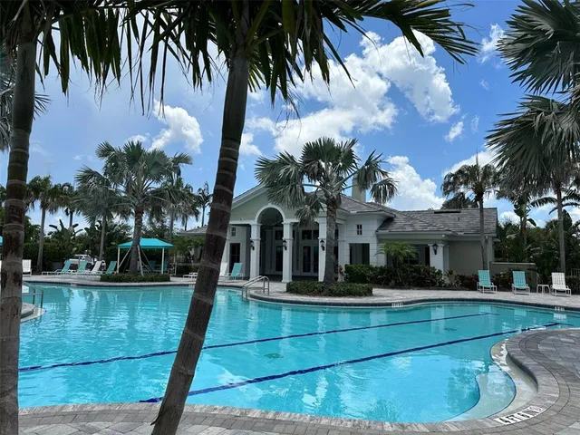 a front view of a house with swimming pool
