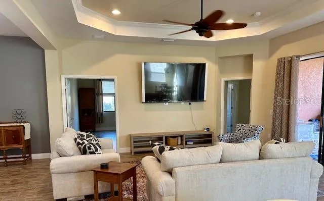 a living room with a couch and a flat screen tv