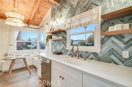 a room with a sink and a window