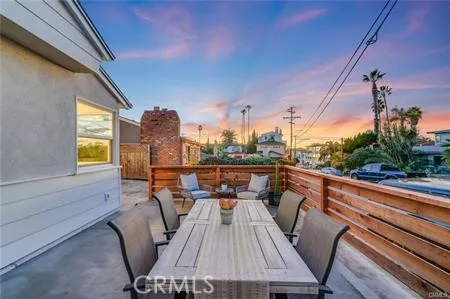 a view of balcony with furniture