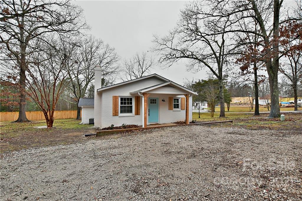 2441 State Rd S-29-305 Lancaster, SC 29720 - Photo 2 of 29 a front view of a house with a yard