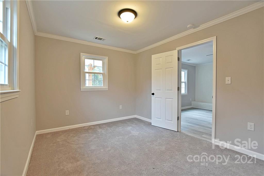 2441 State Rd S-29-305 Lancaster, SC 29720 - Photo 15 of 29 an empty room with windows and closet