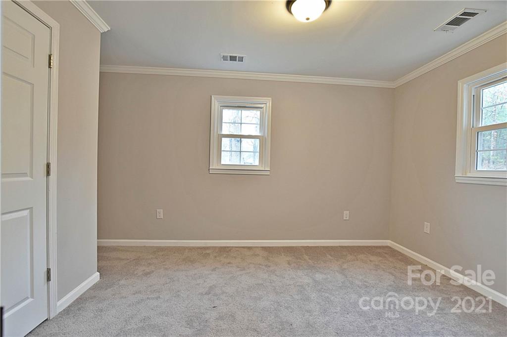 2441 State Rd S-29-305 Lancaster, SC 29720 - Photo 16 of 29 a room that has a window in it