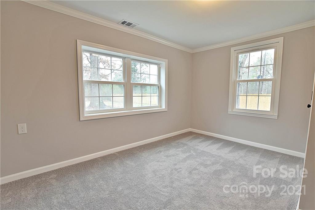 2441 State Rd S-29-305 Lancaster, SC 29720 - Photo 17 of 29 an empty room with windows