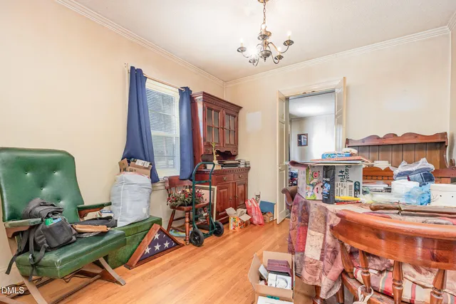 a very nice looking room with lots of furniture and a chandelier