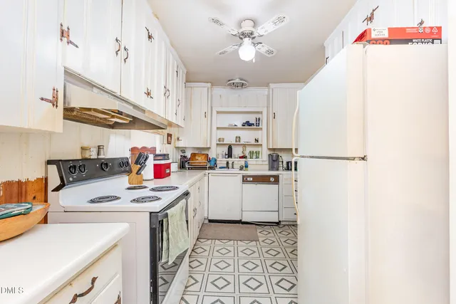 a storage room with washer and dryer