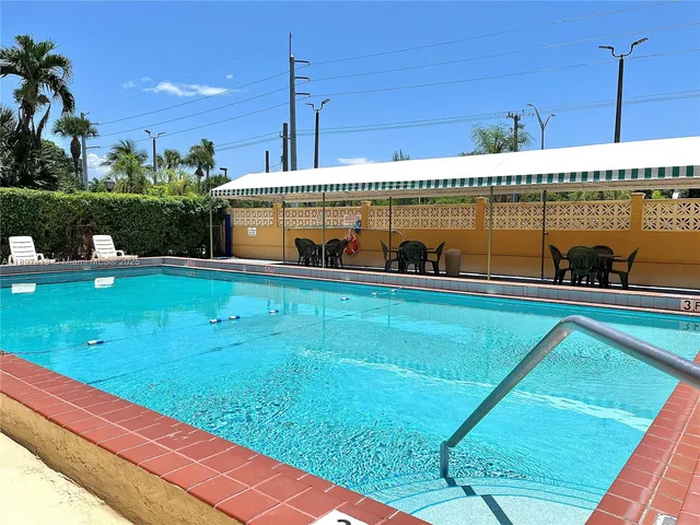 a view of a garden with potted plants