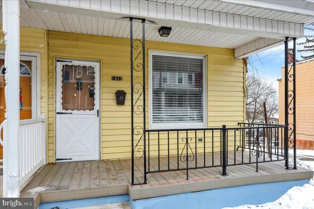 a view of a porch with a door