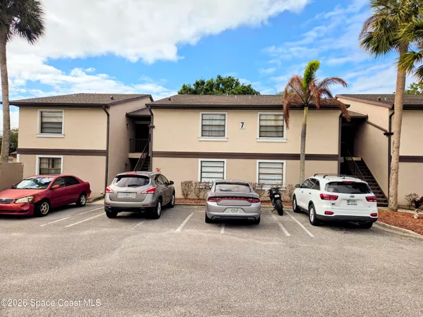 a car parked in front of a house