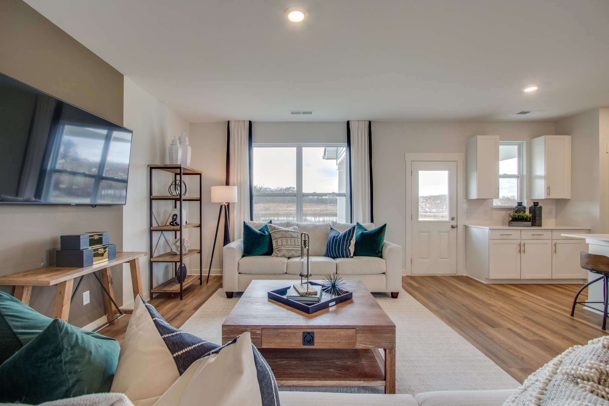 2466 William's Rdg Drive Columbia, TN 38401 - Photo 5 of 10 The spacious family room flows seamlessly extends the other main spaces, making it an ideal for entertaining guests with direct access to the outdoor patio for indoor-outdoor living.